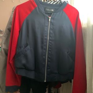 red & blue bomber jacket